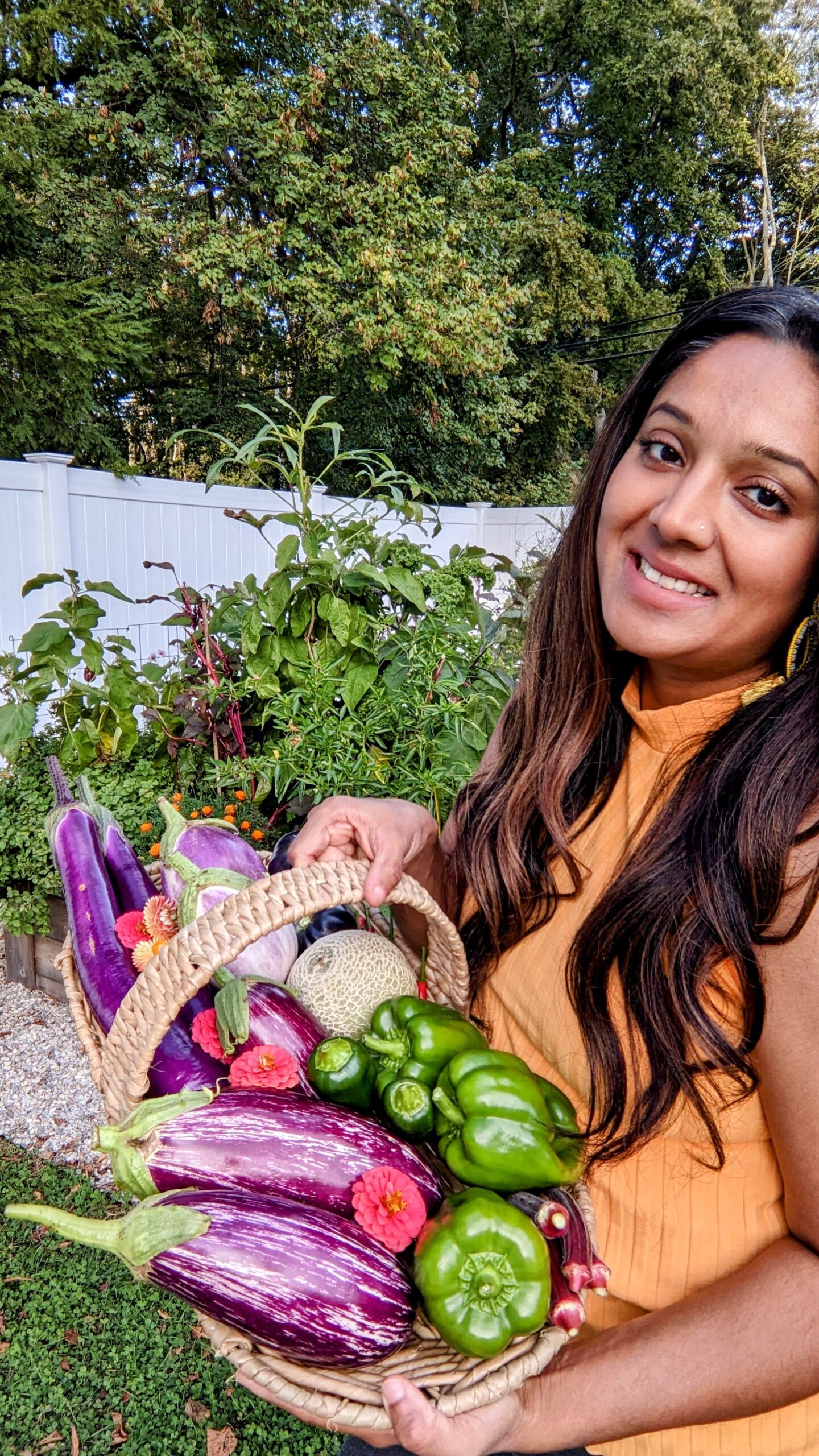 Far-Momin-Close-Up-Harvest-Basket-Full-Of-Veggies-Smiling-In-Her-Garden